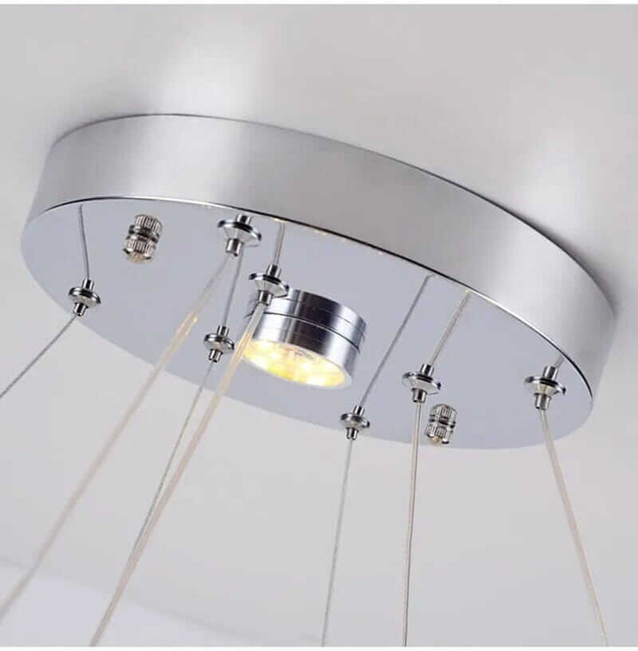 Modern entryway chandelier ceiling mount with sleek chrome finish and adjustable hanging cables.