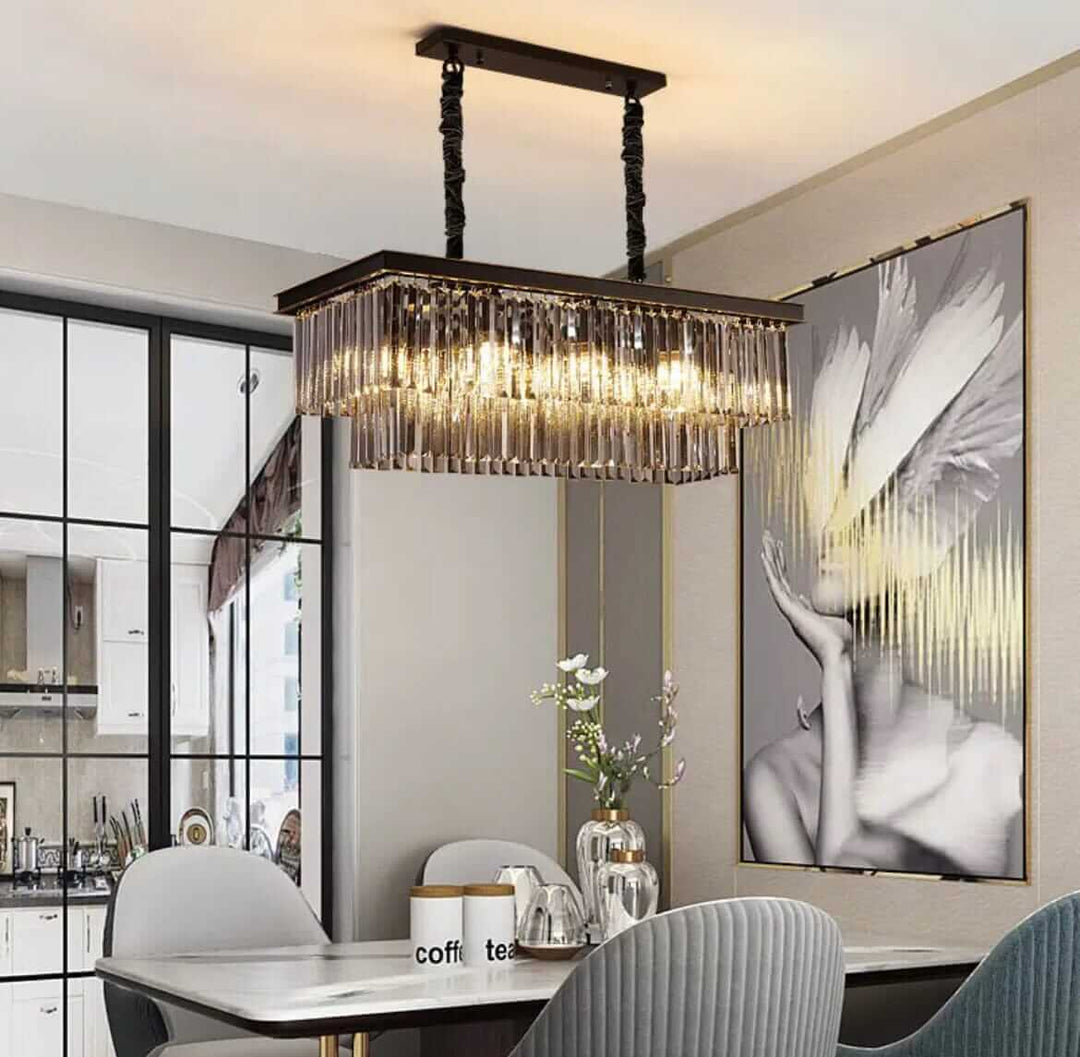 Elegant black chandelier illuminating a modern dining area, creating a captivating ambiance.