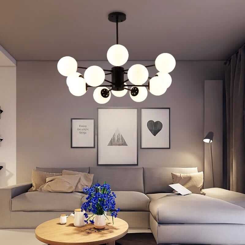 Stylish Bubble Sputnik Chandelier illuminating a cozy living room with modern decor and comfortable seating.