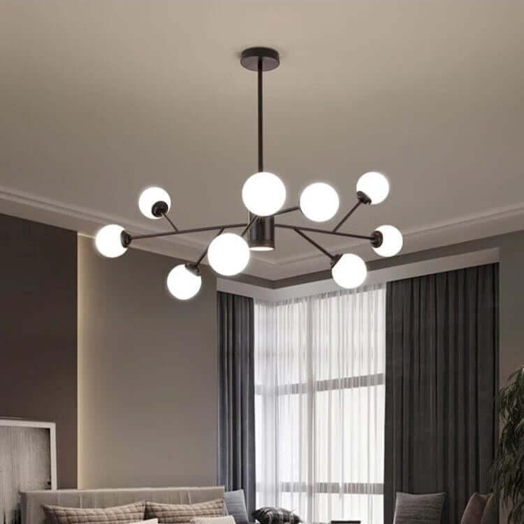 Modern bubble chandelier in a stylish bedroom, showcasing elegant design and soft lighting.