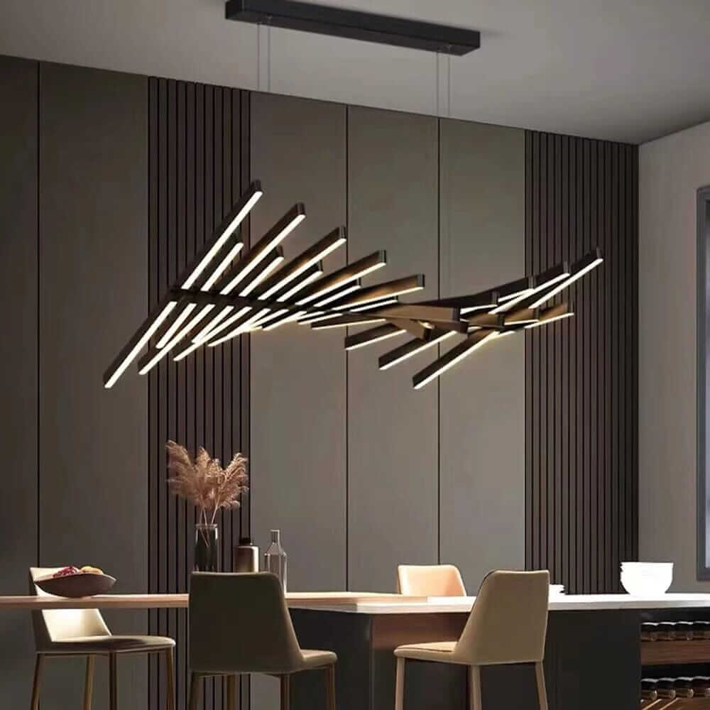 Modern black chandelier with LED lights above a dining table in a stylish, minimalist room.