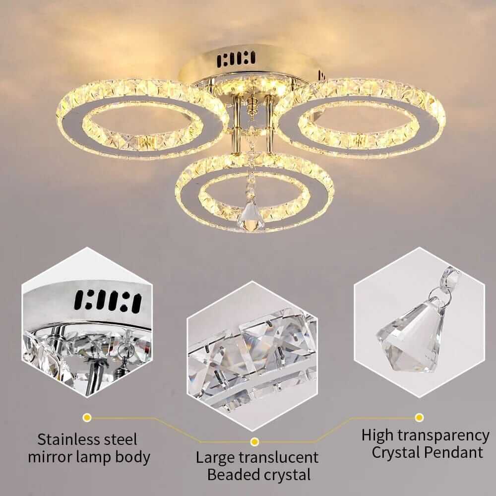 Small crystal chandelier with stainless steel lamp body and translucent beaded crystals, adding elegance to any space.