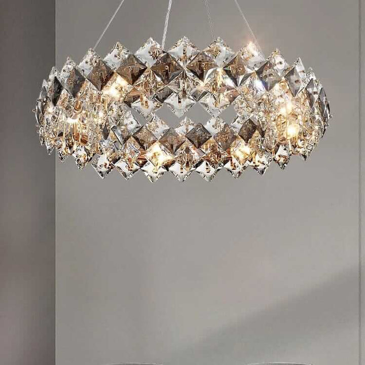 Round chandelier featuring intricate crystal design that shimmers and adds elegance to any room.