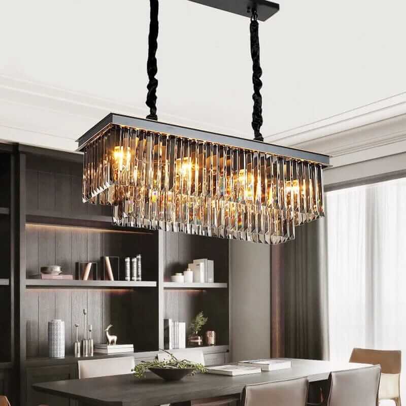 Black chandelier with crystal accents illuminating a modern dining area, creating a mesmerizing ambiance.
