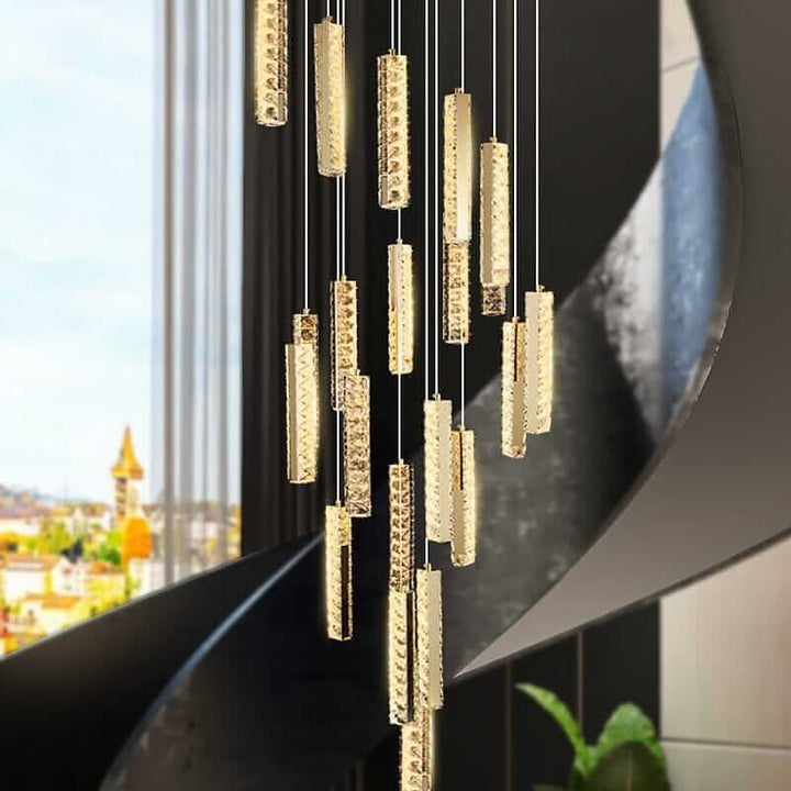 Staircase chandelier with golden crystal elements, creating an elegant ambiance for modern interiors.