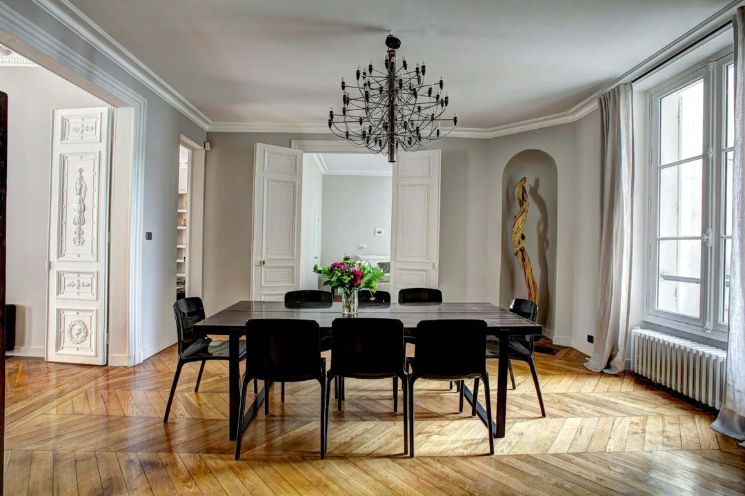 Elegant dining room featuring a stylish table and comfortable dining chairs for a perfect dining experience.