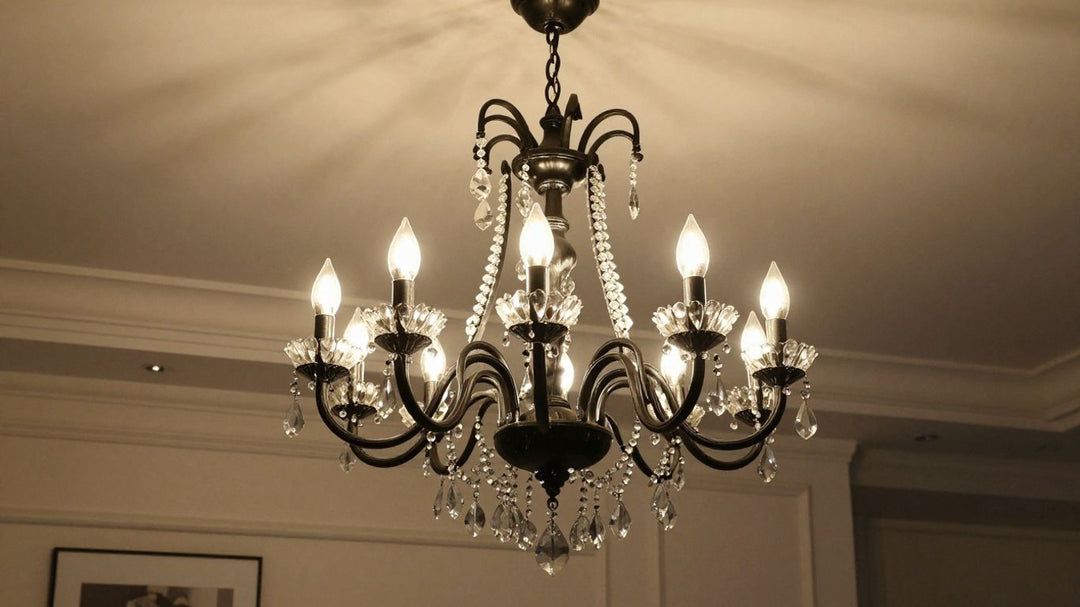 Elegant black chandelier light fixture in a modern room.