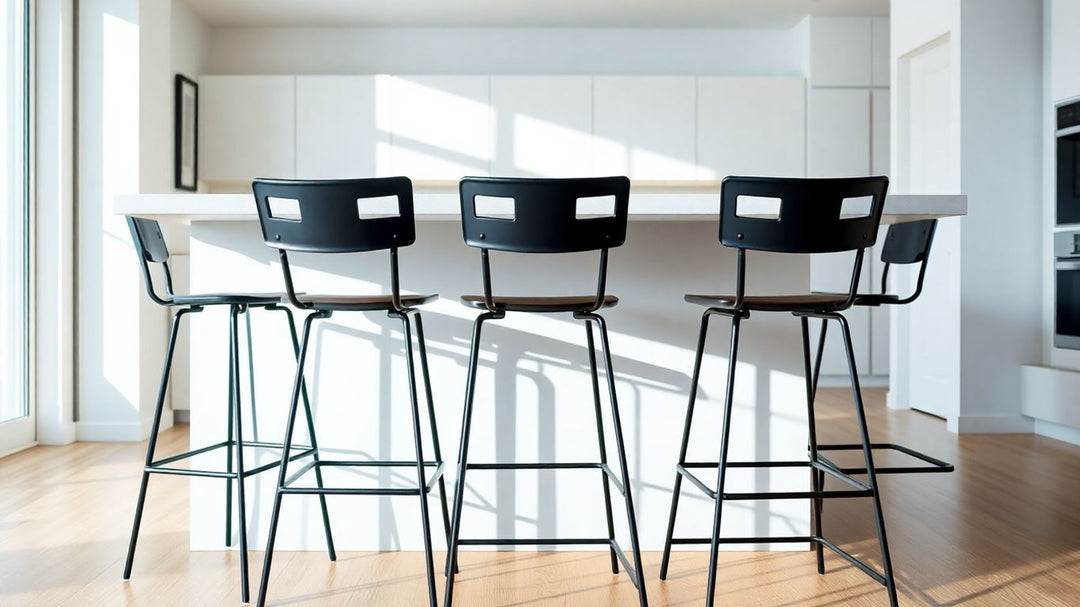 Black metal bar stools at a modern kitchen island.