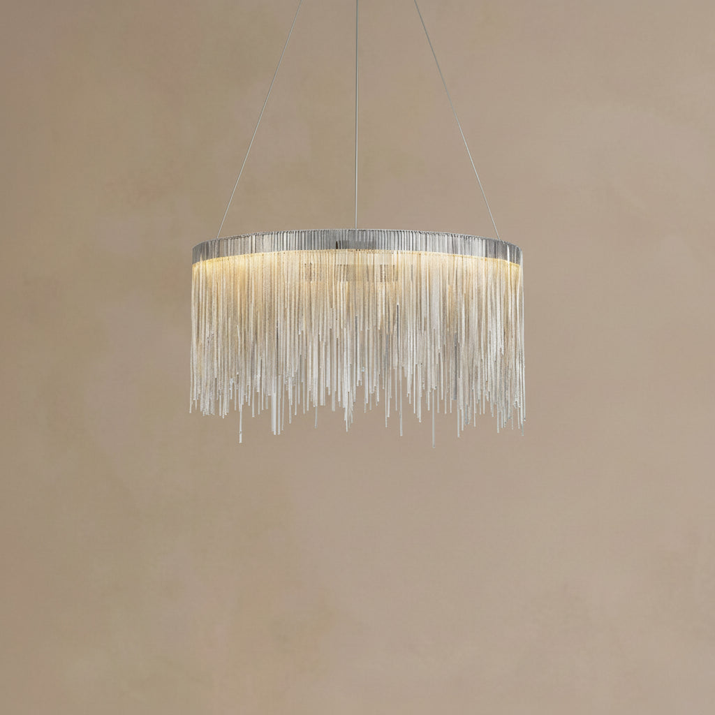 Chandelier with hanging crystals on a beige background