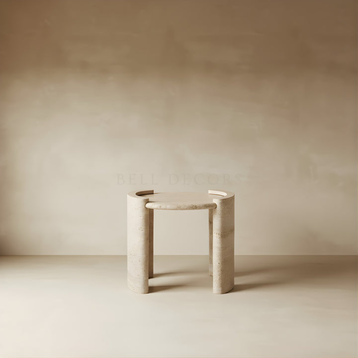 Minimalist beige side table against a plain beige wall
