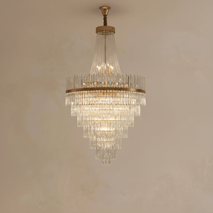 Chandelier hanging against a beige wall