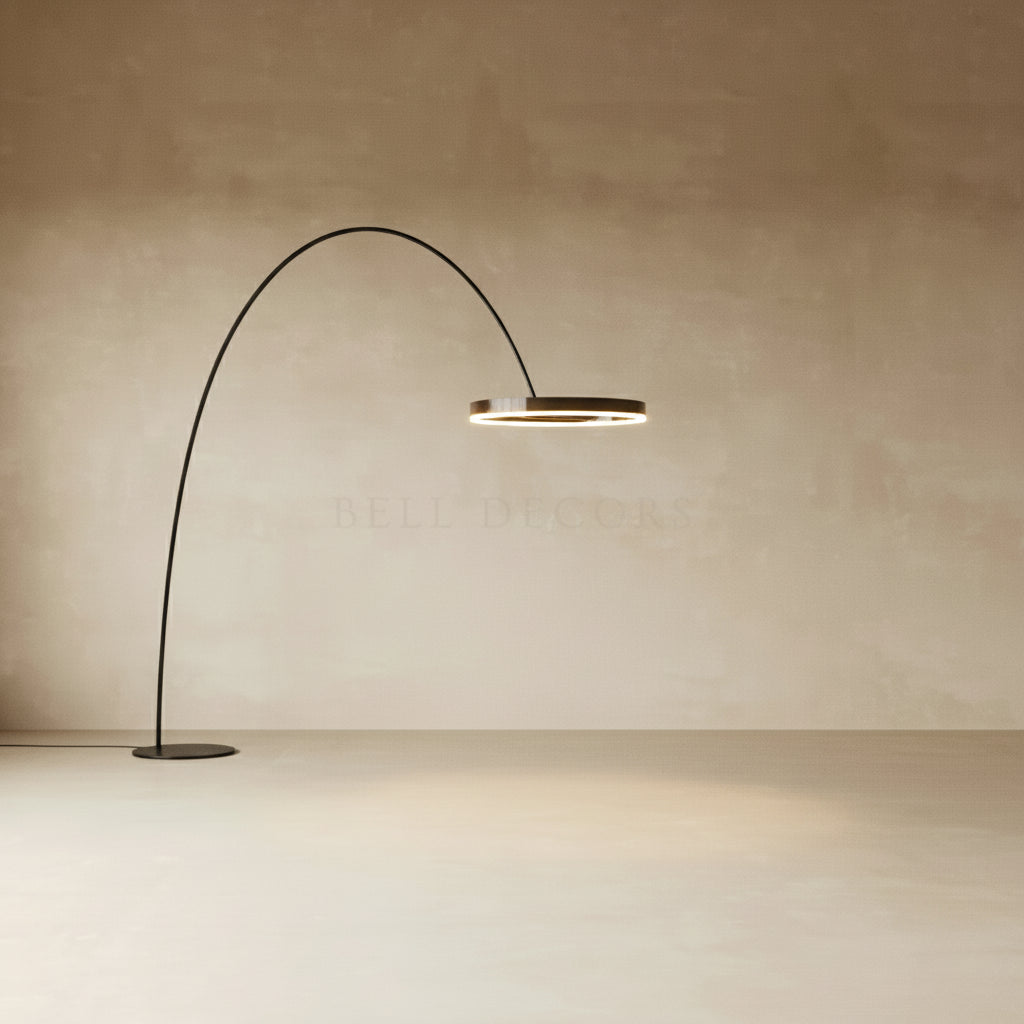 Modern floor lamp with curved design on a plain background