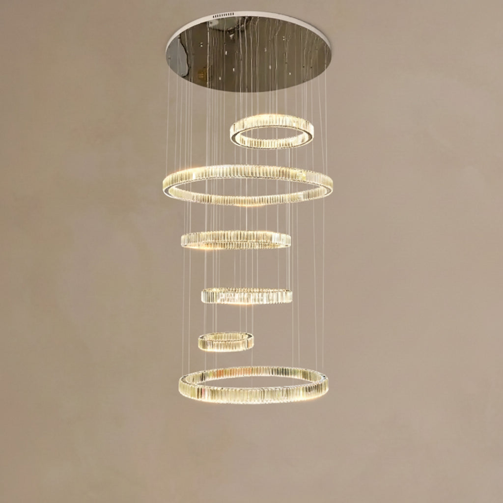 Chandelier with multiple circular rings on a beige background