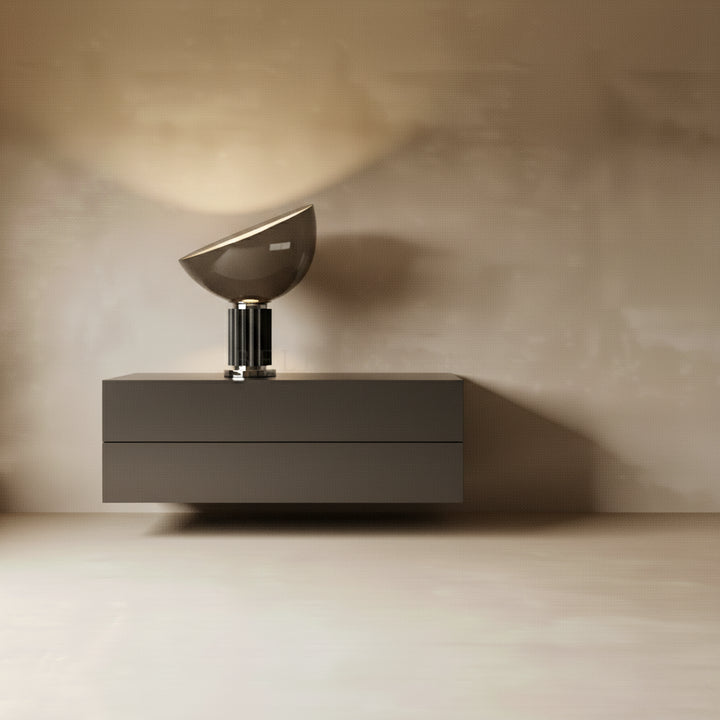 Modern wall-mounted light fixture on a neutral background