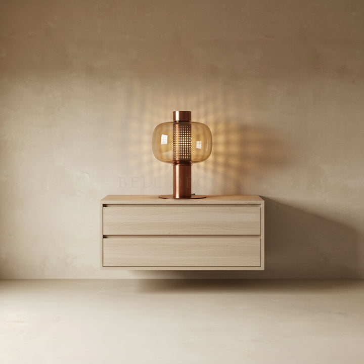Modern floating nightstand with a lamp against a beige wall