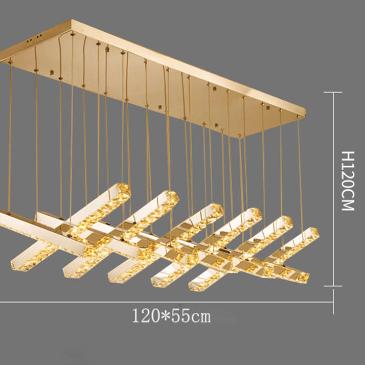 Gold pendant light fixture with dimensions on a gray background