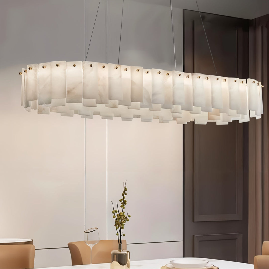 Linear Chandelier - LED Chandelier illuminating a modern dining area with elegant design features.