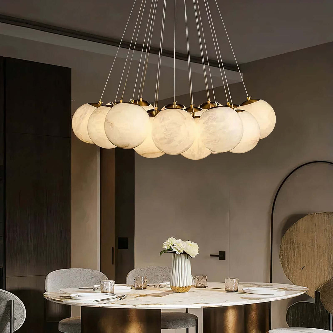 Wood Chandelier - Bubble Chandelier illuminating a dining area with soft, glowing ball shades and elegant design.