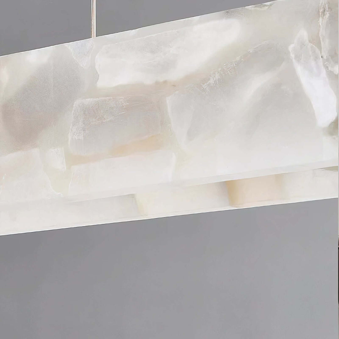 White Pendant Light - Modern LED Ceiling Light showcasing its sleek marble alabaster finish.