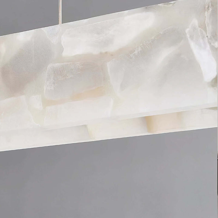 White Pendant Light - Modern LED Ceiling Light showcasing its sleek marble alabaster finish.