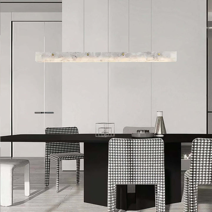 White Pendant Light - Modern LED Ceiling Light illuminating a sleek dining area with modern furniture.