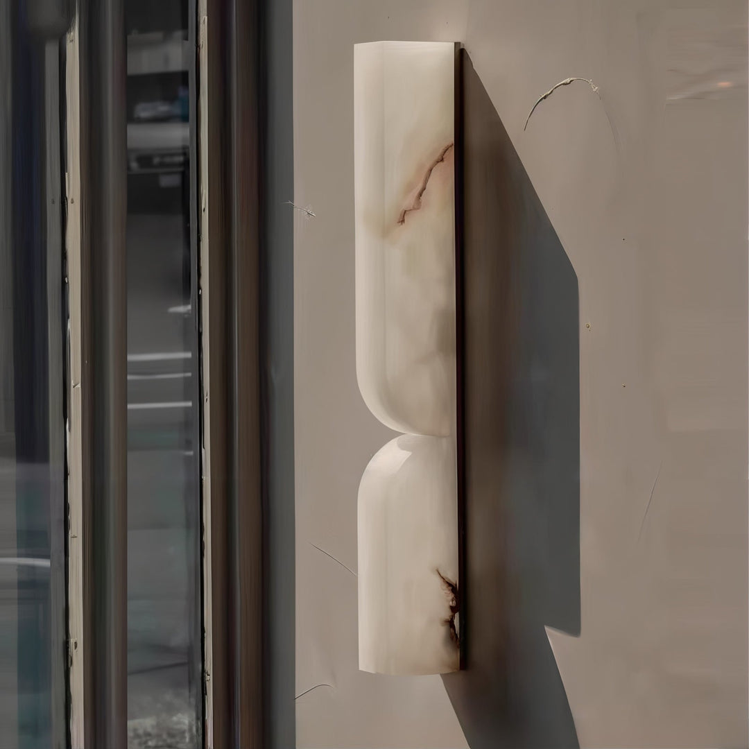 LED Lighting Wall Art - Modern & Luxury featuring a sleek alabaster wall sconce casting soft ambient light.