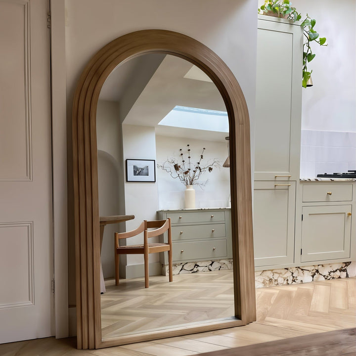 Large Floor Mirror - Arched Mirror in stylish interior, featuring arched frame and full-length reflective surface.