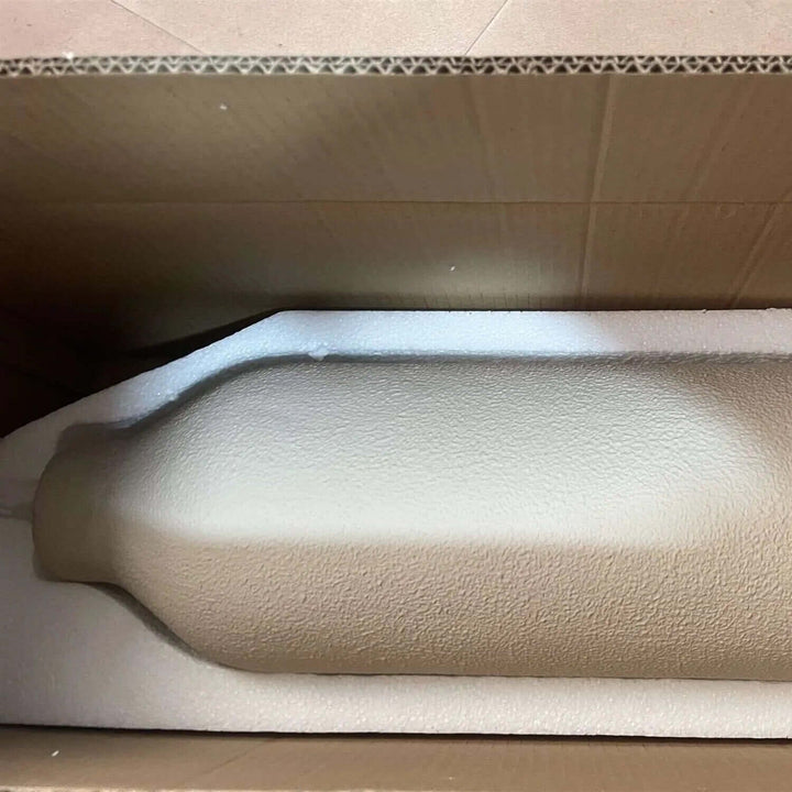 Wabi Sabi pendant light packaging with white protective foam inside a cardboard box.