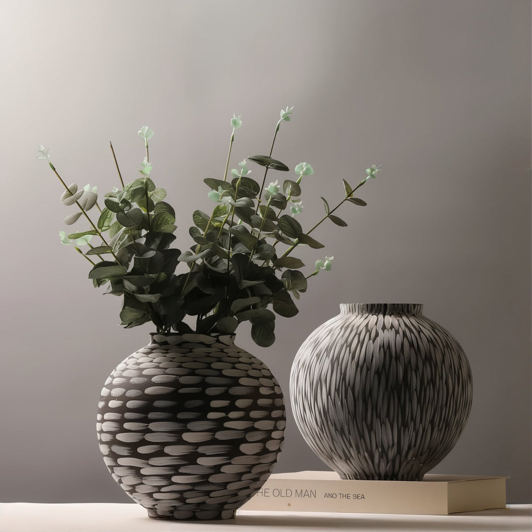 Ceramic Vases - Decorative Vases featuring two unique handcrafted vases with floral arrangements.