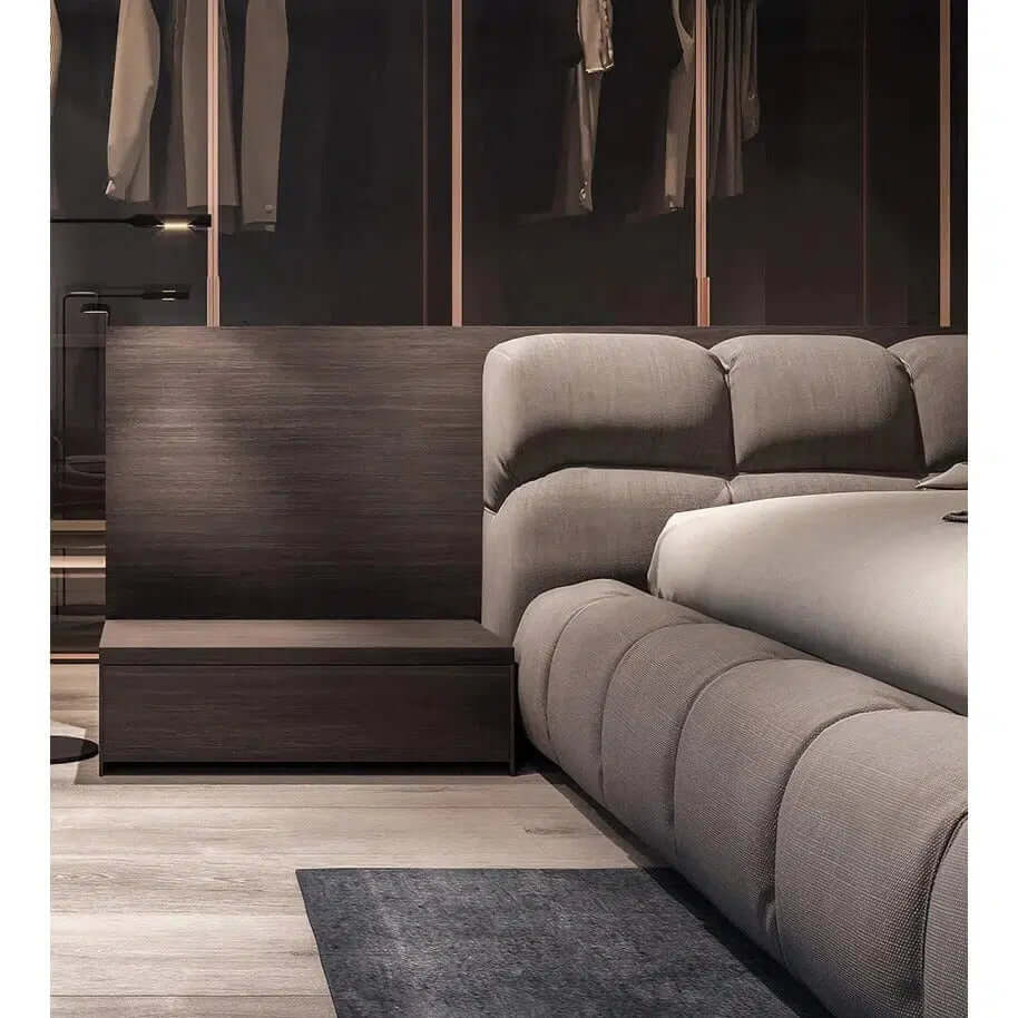 California King Bed - Modern & Luxurious with tufted linen and dark wood base in a stylish bedroom setting.