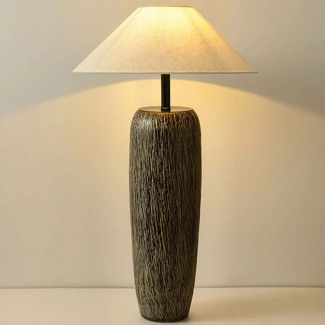 Black Table Lamp - Artistic Beauty, elegant ceramic design with a soft fabric shade providing practical illumination.