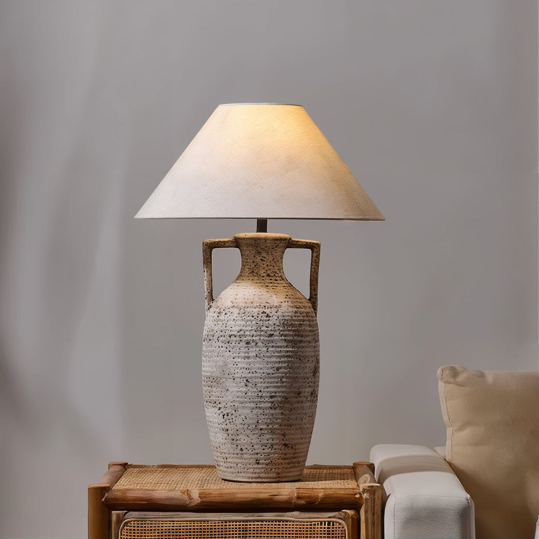 Mid Century Table Lamp - Imperfectly Perfect with ceramic base and unique shade illuminating a cozy space.