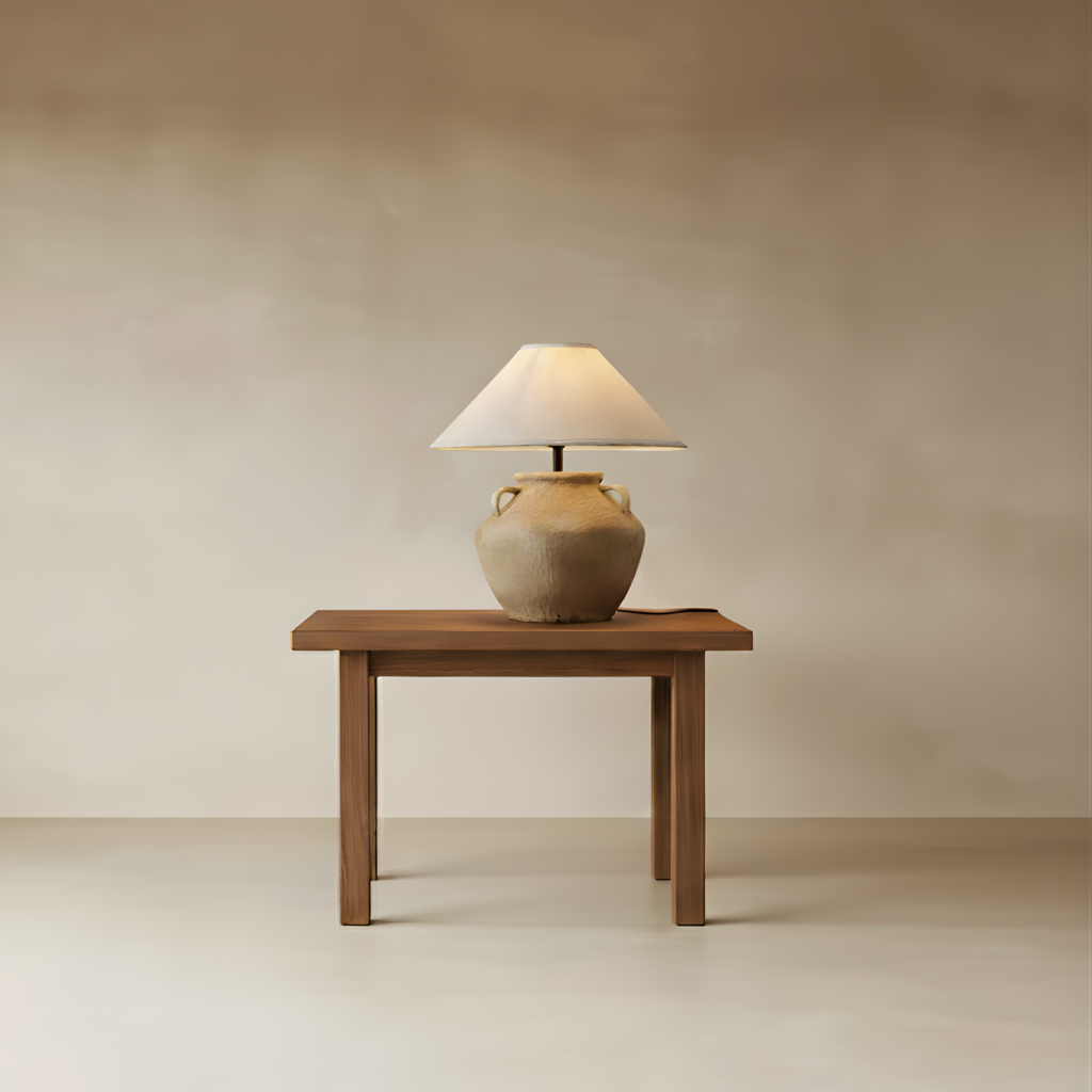 Mid Century Table Lamp - Imperfect Beauty on a wooden table, featuring a natural pottery base and soft illumination.
