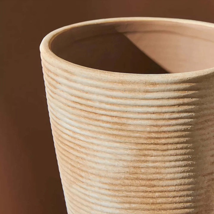 Ceramic Vases - Decorative Vases showcasing a ridged beige ceramic vase in Nordic style.