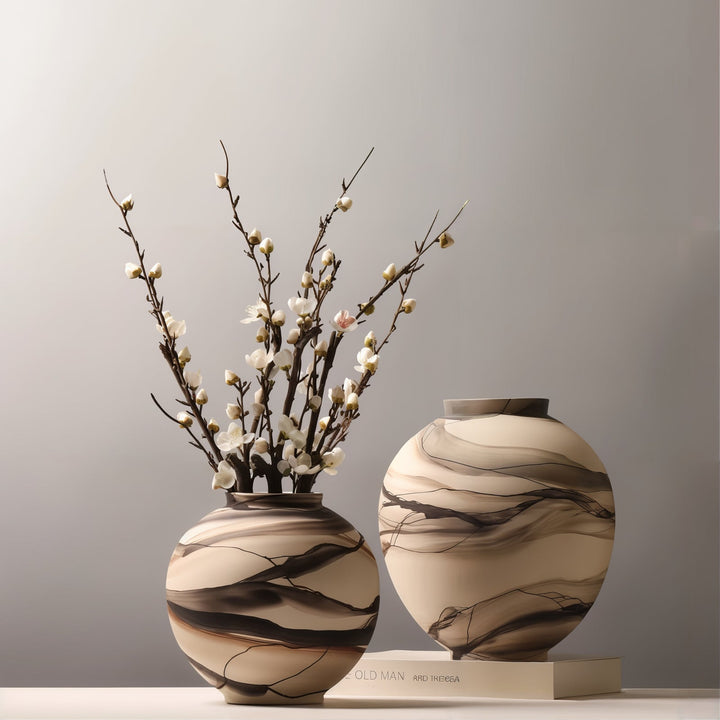 Decorative Vases - Ceramic Vases showcasing elegant vases with floral arrangements and modern design elements.