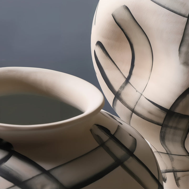 Ceramic Vases - Decorative Vases showcasing unique designs with sleek lines and minimalist style.