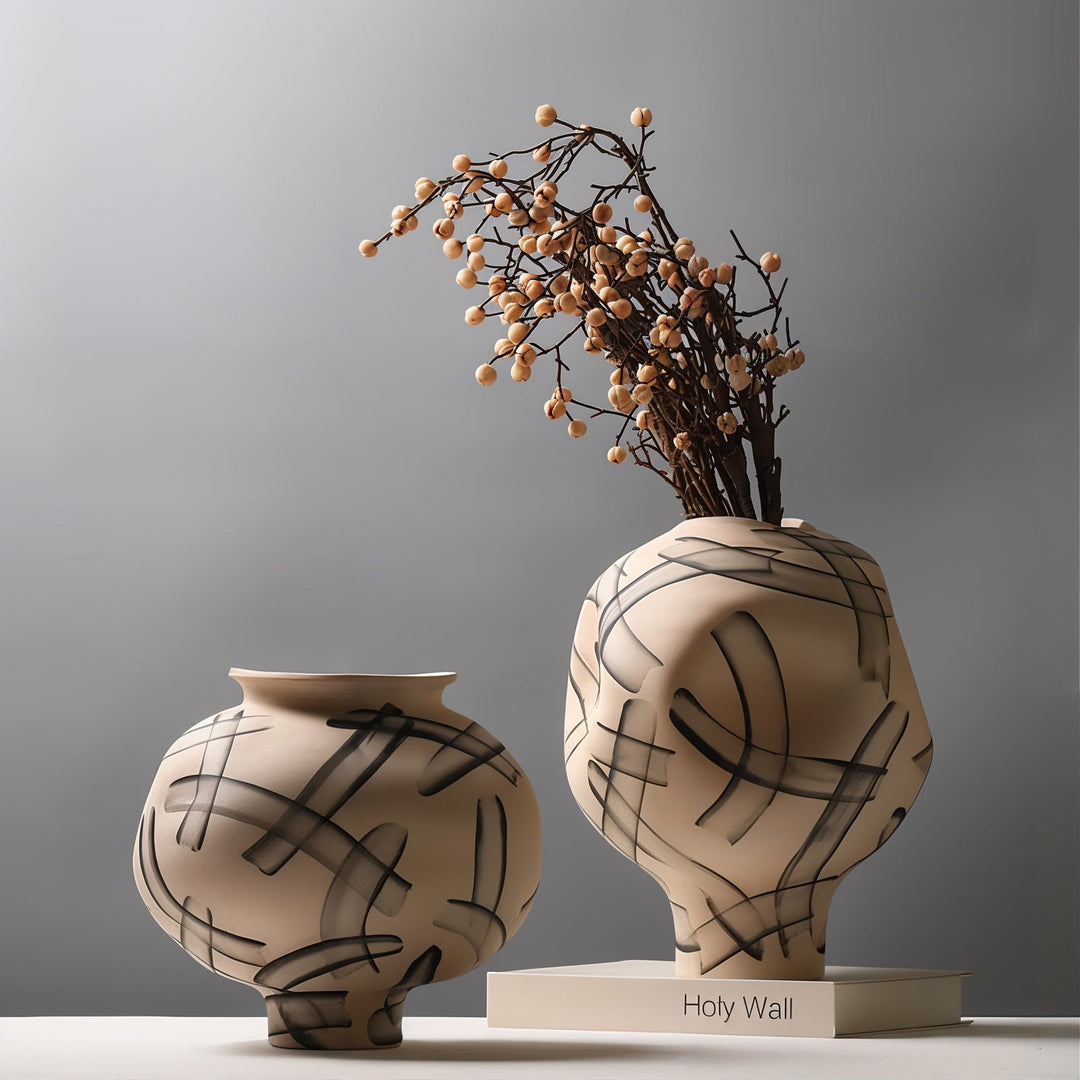 Ceramic Vases - Decorative Vases displayed with floral arrangement in a modern and minimalist style.