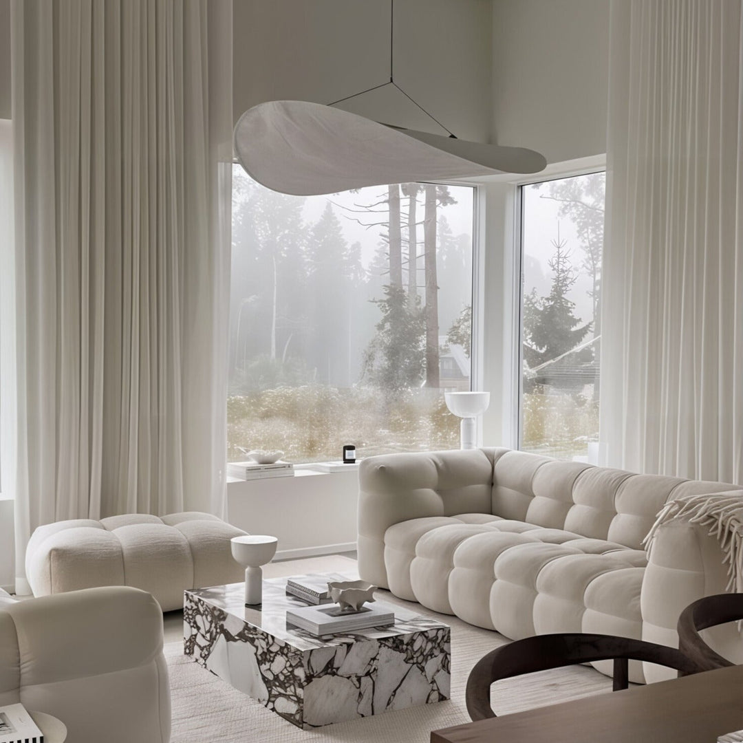 Cloud Sofa - 3 Seater Sofa in a modern living room with natural light and elegant decor.