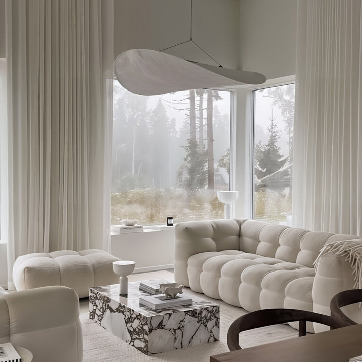 Cloud Sofa - 3 Seater Sofa in a modern living room with natural light and elegant decor.