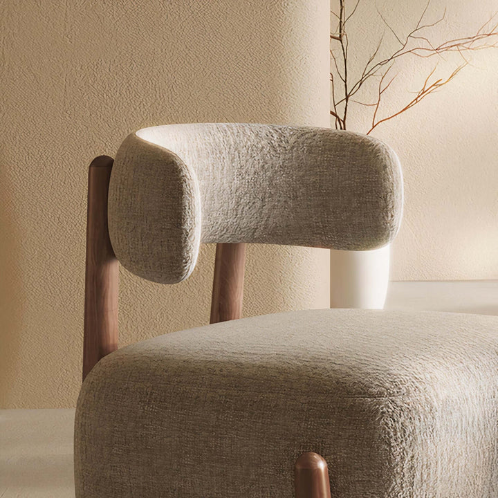 Comfortable Reading Armchair - Mid Century Armchair with stylish boucle design and natural wood accents.