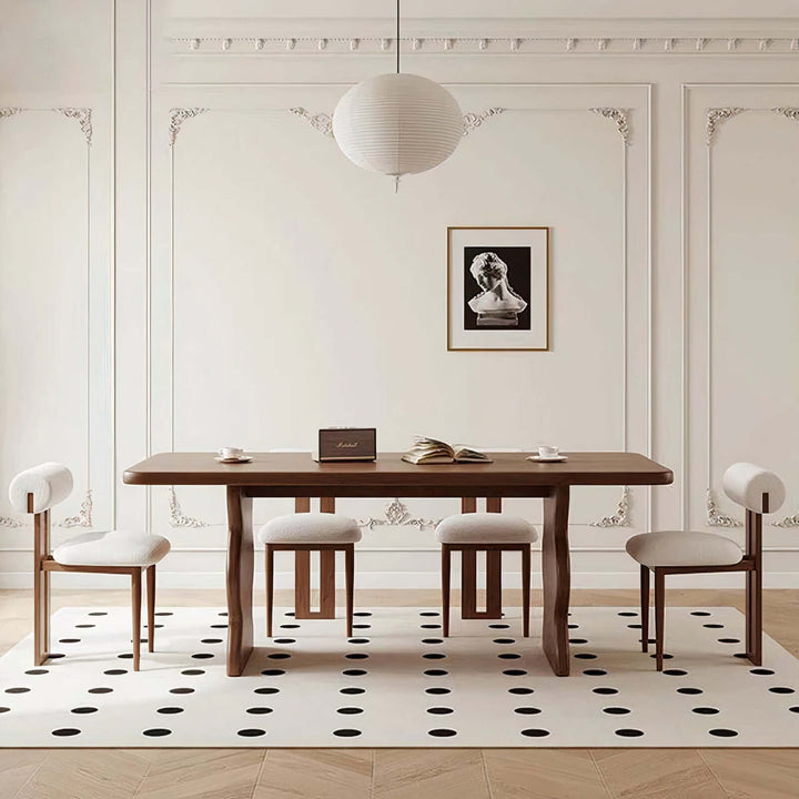 Dark Wood Dining Table - Lavish & Finesse set in an elegant dining room with modern decor and stylish chairs.