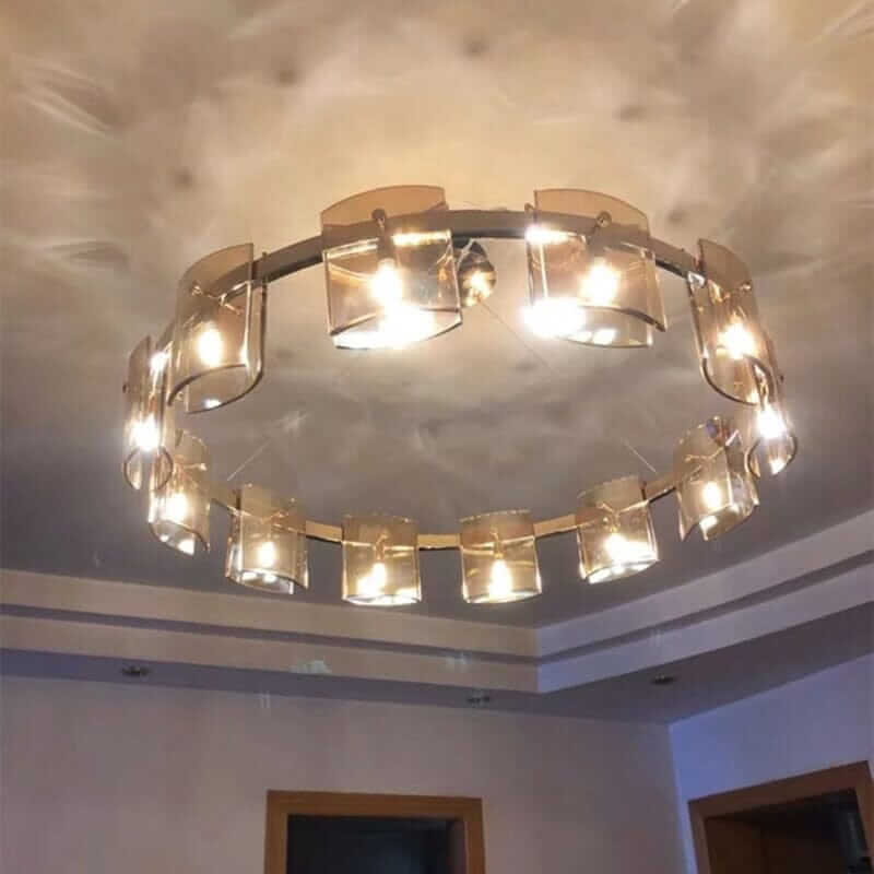 Modern LED chandelier with elegant glass shades, illuminating a room with a warm, inviting glow.