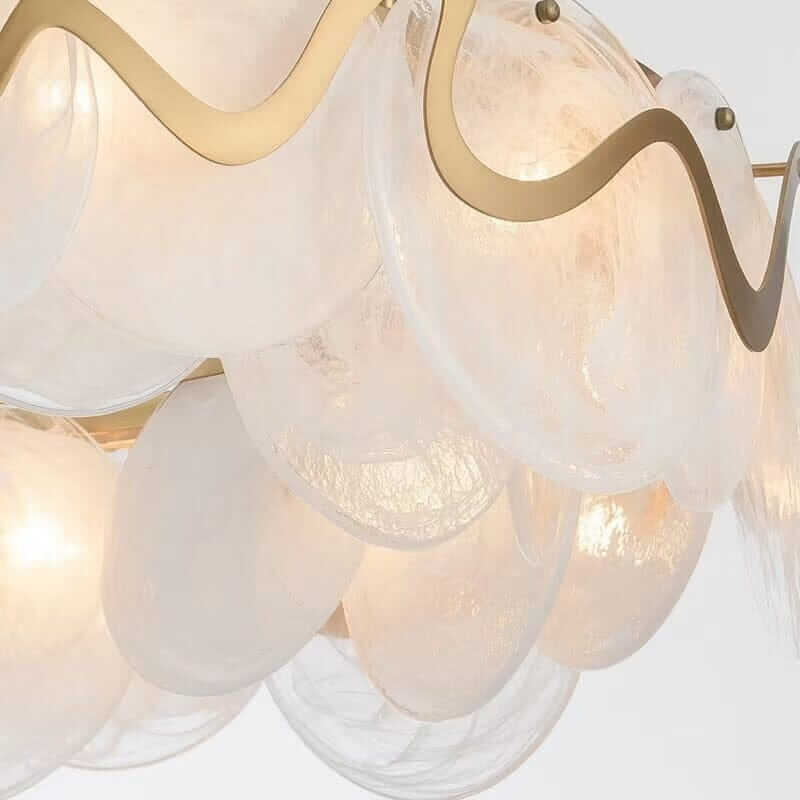 Elegant glass luster gold iron chandelier featuring a contemporary design with warm glowing lights.