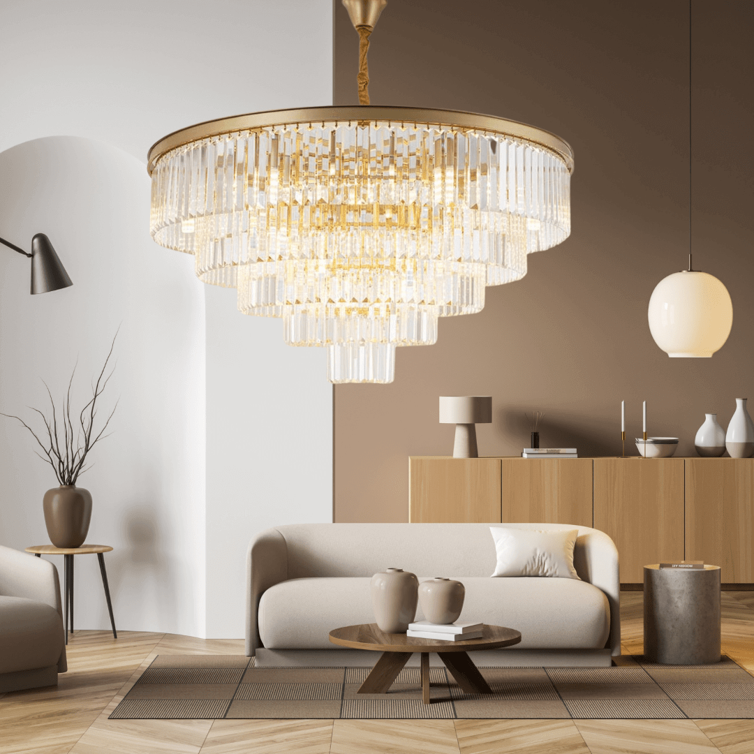 Stylish Gemima Round Golden Crystal Chandelier illuminating a modern living room with elegant decor.