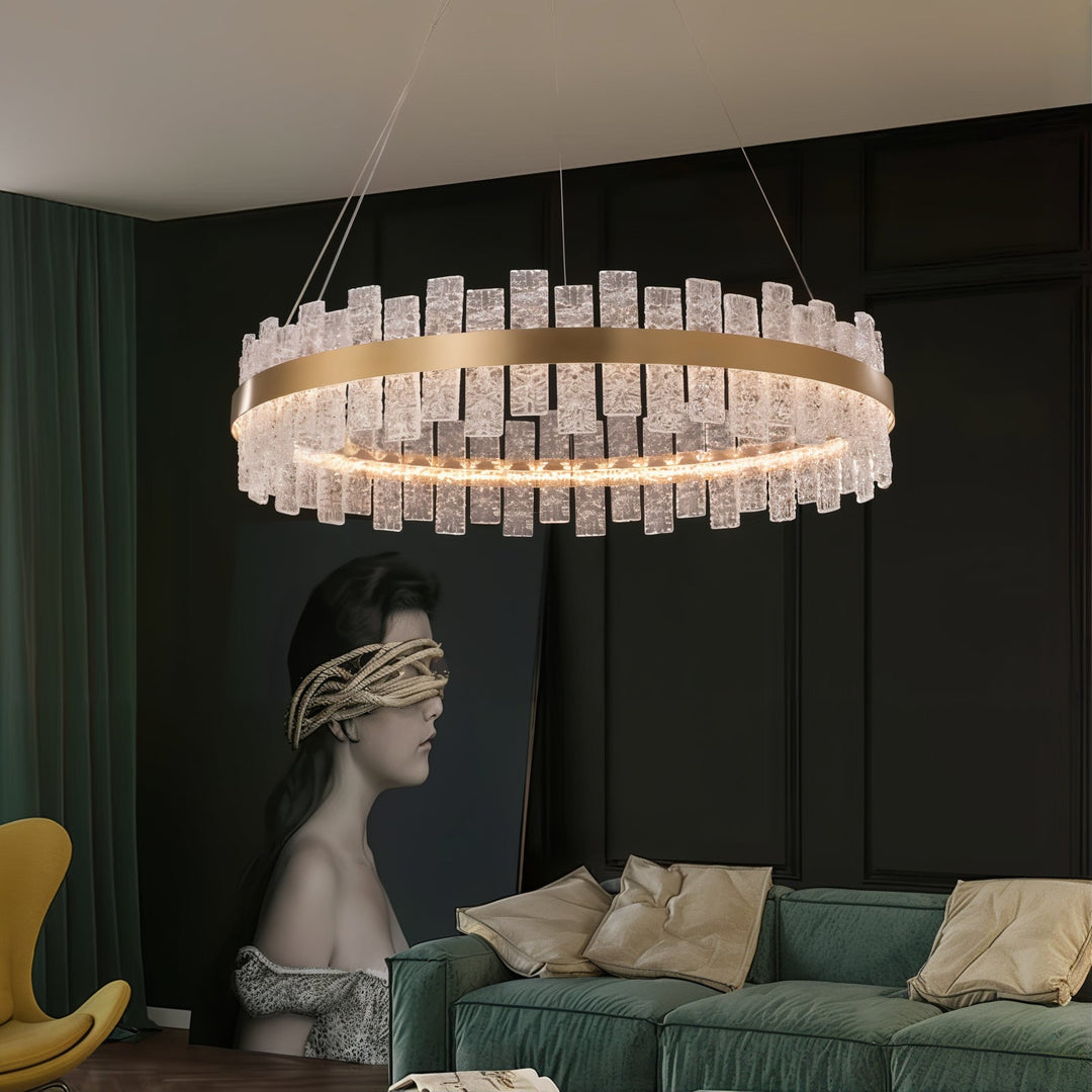 Gold Chandelier - Linear Chandelier in modern living room with elegant design and glass elements.