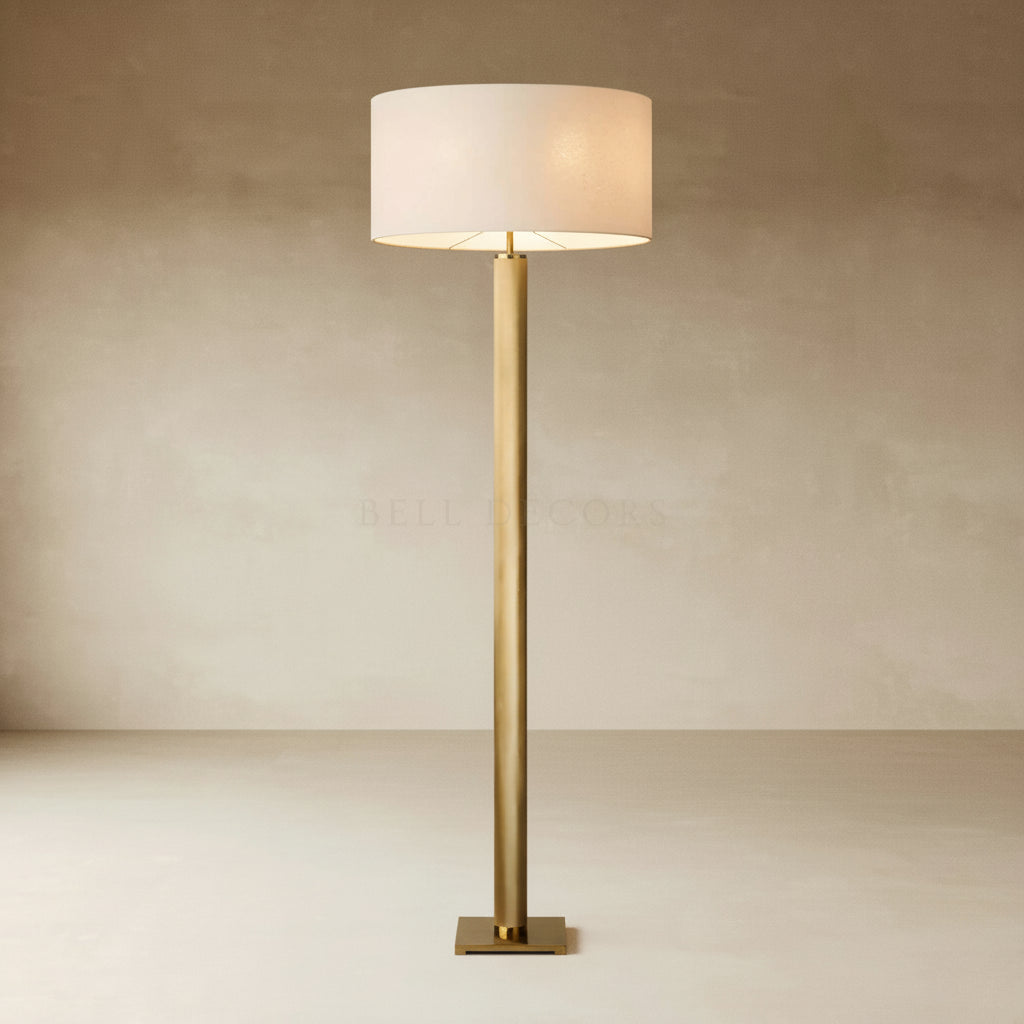 Gold Floor Lamp - Contemporary & Chic in brass with a white shade, adding elegance to modern interiors.