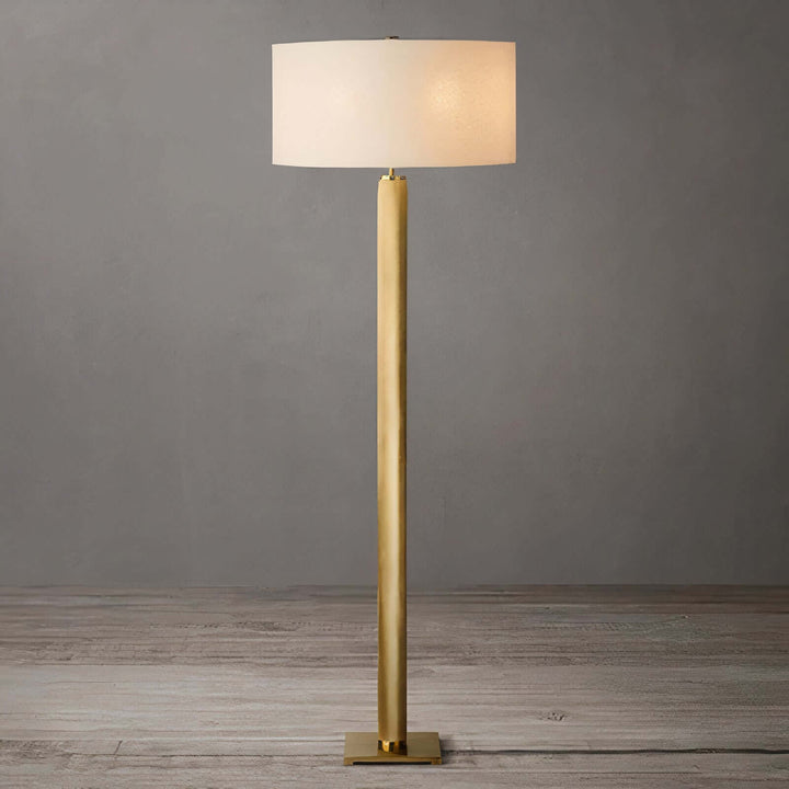 Gold Floor Lamp - Contemporary & Chic with a sleek brass design and a white shade, adding elegance to any room.