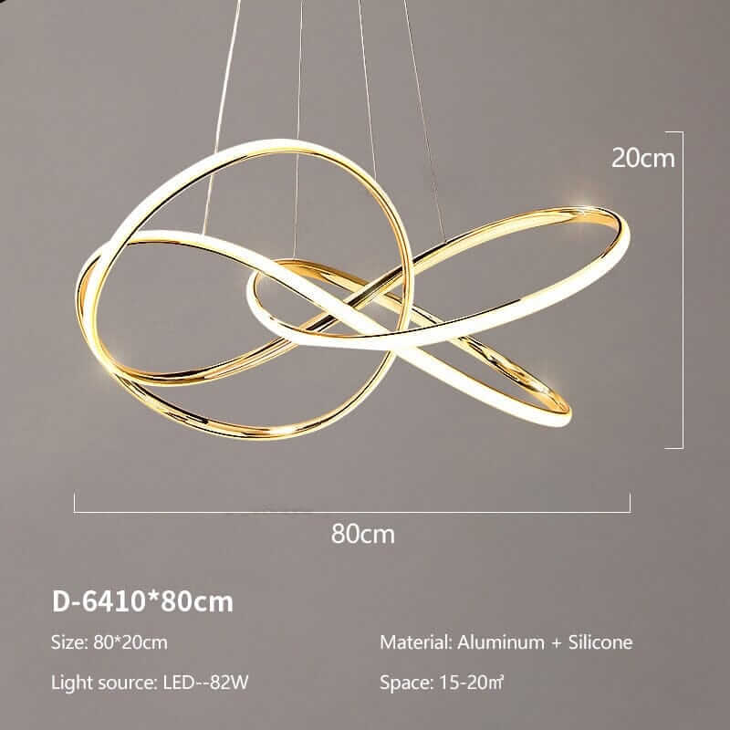 Gold chandelier in modern design, featuring intertwined circular shapes, made of aluminum and silicone, with integrated LED lighting.