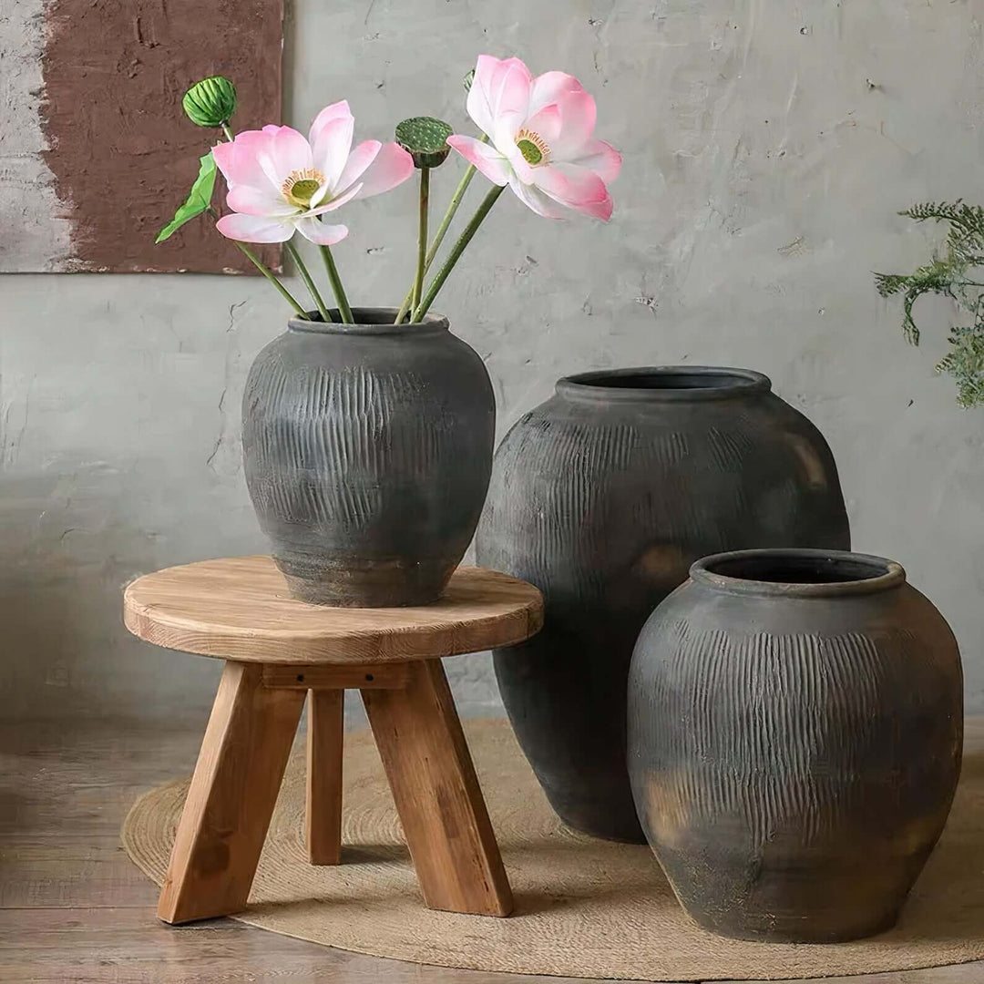 Ceramic Large Planter Pots - Large Indoor Plant Pots displayed with decorative flowers on a wooden table.