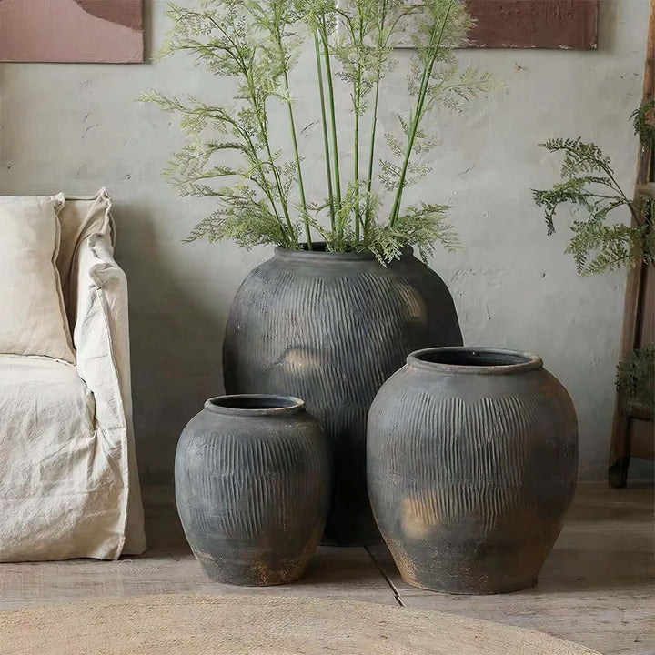 Ceramic Large Planter Pots - Large Indoor Plant Pots displayed with greenery in a modern interior setting.